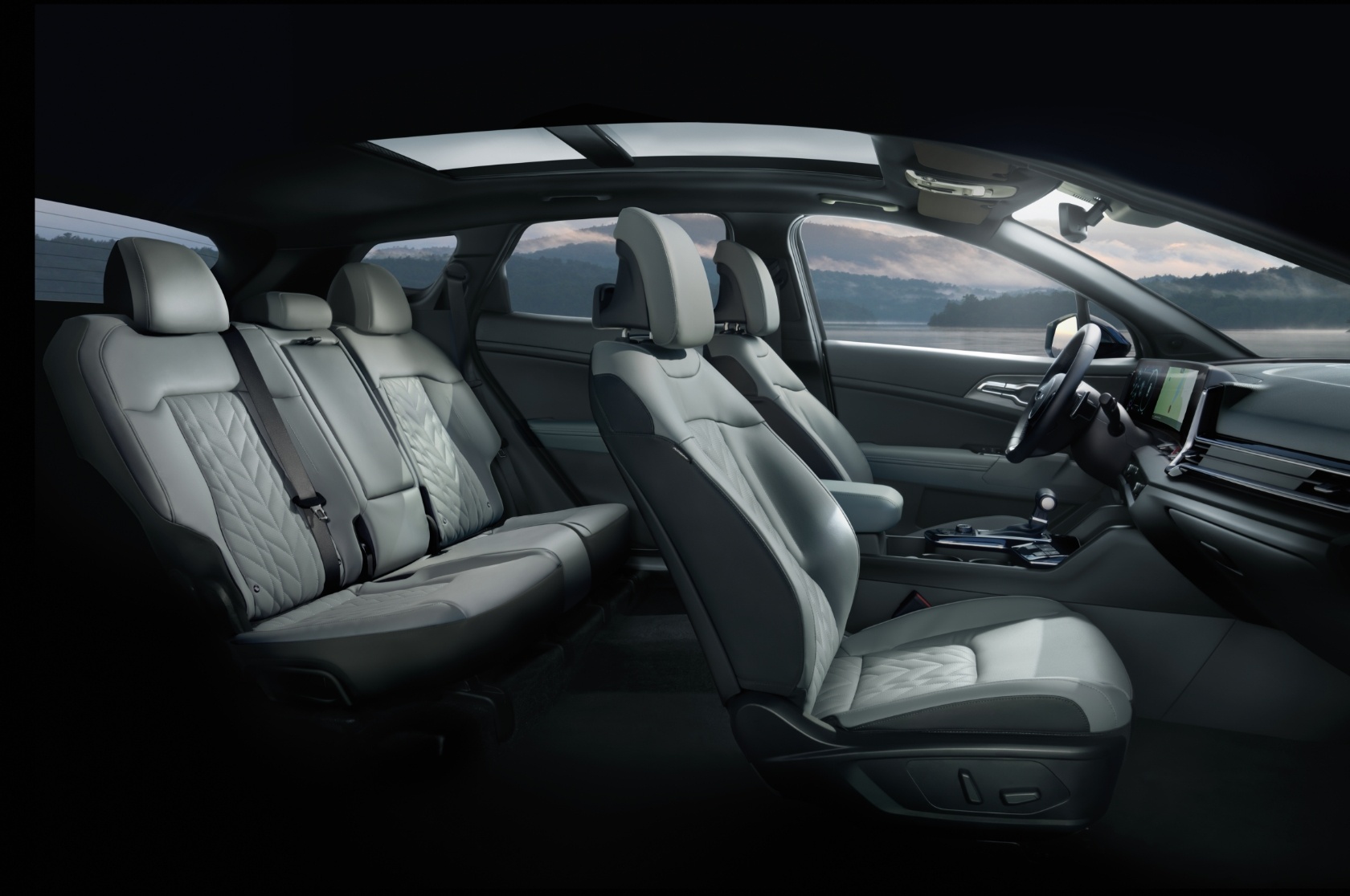 2025 Kia Sportage interior, side view of the spacious first and second row seats