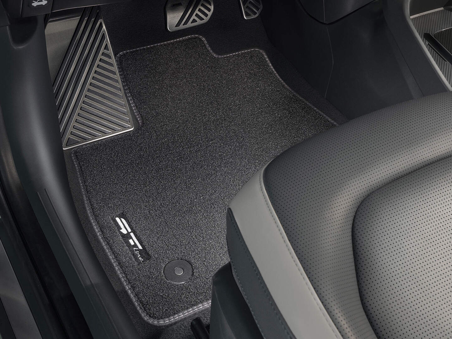 Black velour floor mats with black trim in a Kia EV3 GT-Line